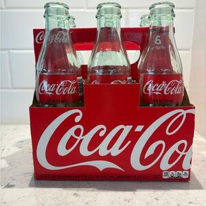 Coca-Cola Red and White Glass Bottle Set